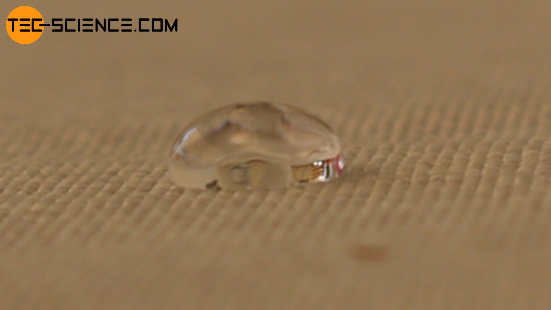 Water droplet on a tablecloth