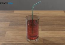 Drinking straw in a glass with water